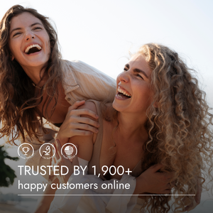 Two women laughing together with text about customer trust on a white background