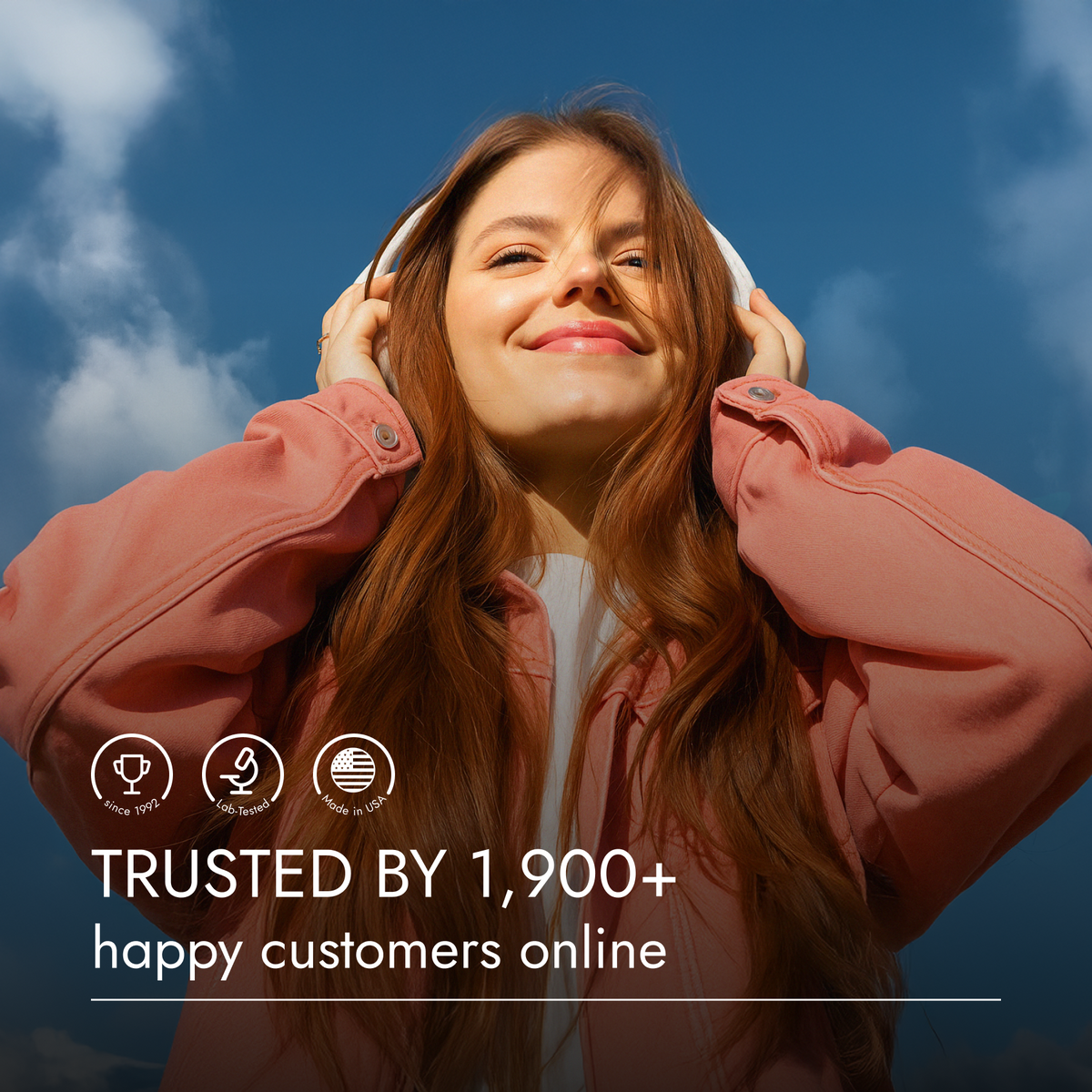 Woman wearing headphones with a blue sky background and text about customer trust.