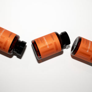 Three vitamin k2+d3 bottles on a white background