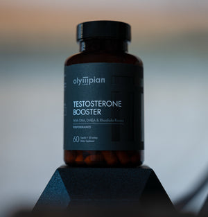 Bottle of Olympian Labs Testosterone Booster on a blurred background