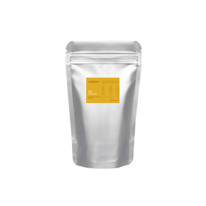 Silver packaging with a yellow label on a white background