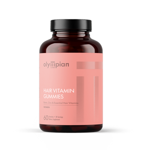 Bottle of Olympian Labs hair vitamin gummies on a white background