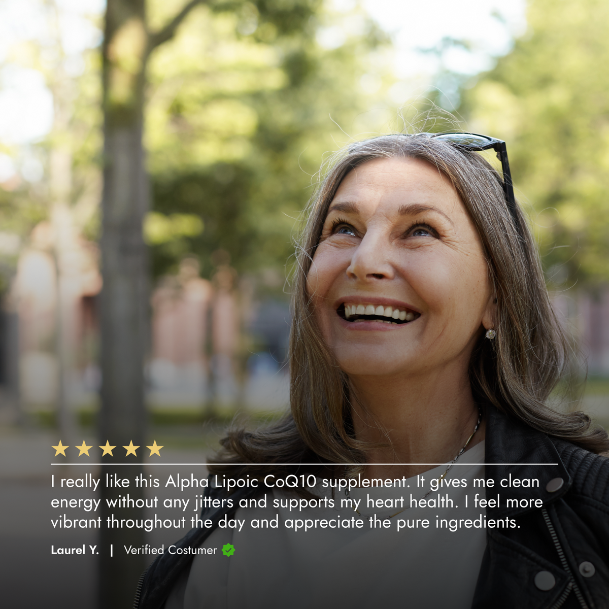 Woman smiling outdoors with a supplement product description overlay