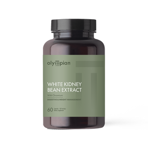 Brown supplement bottle with green label on a white background